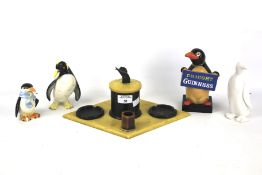 An assortment of penguin figures and novelties.