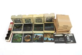 Four boxed sets of magic lantern slides.