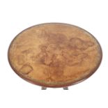 A Georgian mahogany circular tilt top occasional table.