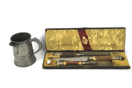 A Victorian horn shafted three piece carving set and a pewter quart tankard.