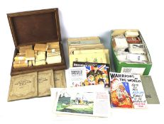 A large collection of cigarette and tea cards.