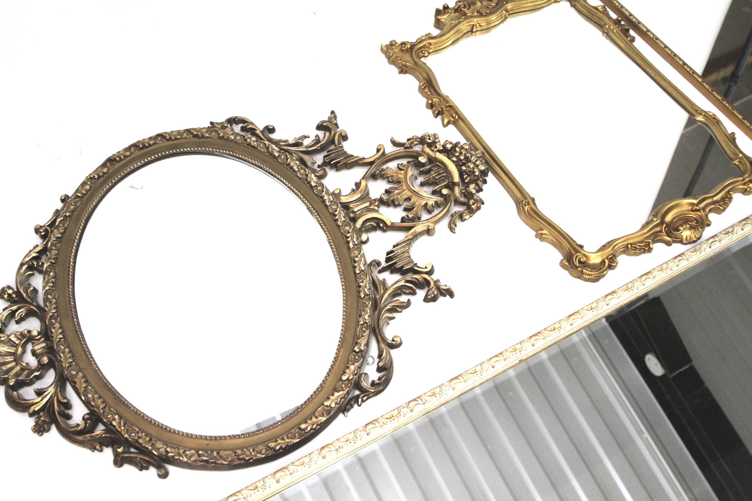 A collection of four gilt framed wall mirrors. - Image 2 of 2