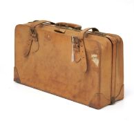 An American brown leather suitcase.
