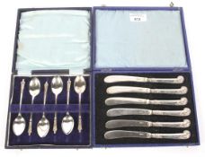 Two boxed sets of flatware.