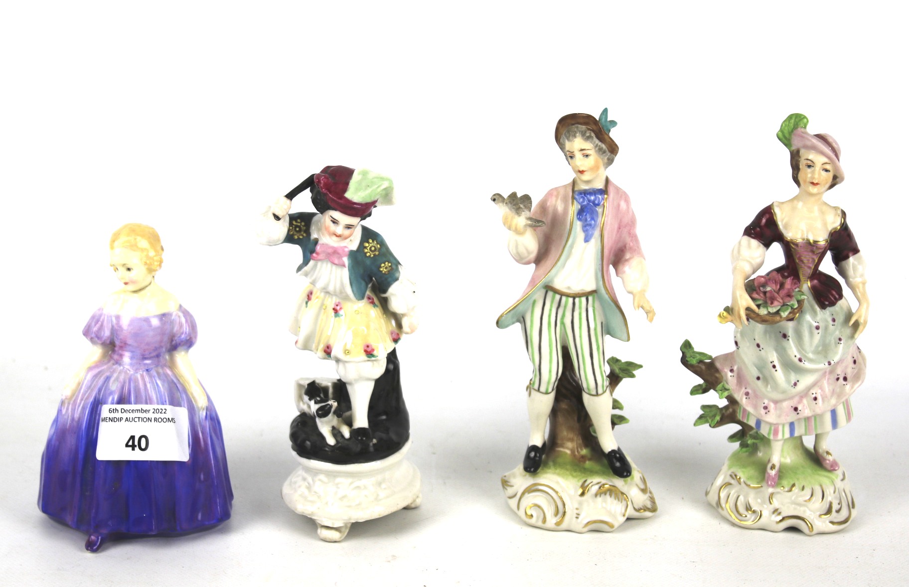 Four 19th and 20th century porcelain figures.