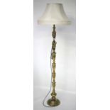 A Chinese brass lampstand.