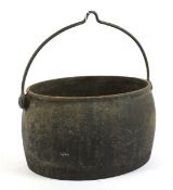 A galvanised lidded pot.