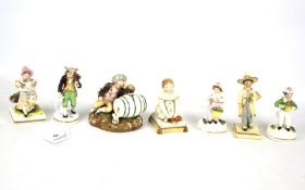 Seven 19th century English porcelain figures.