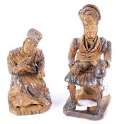 A pair of pottery figures.