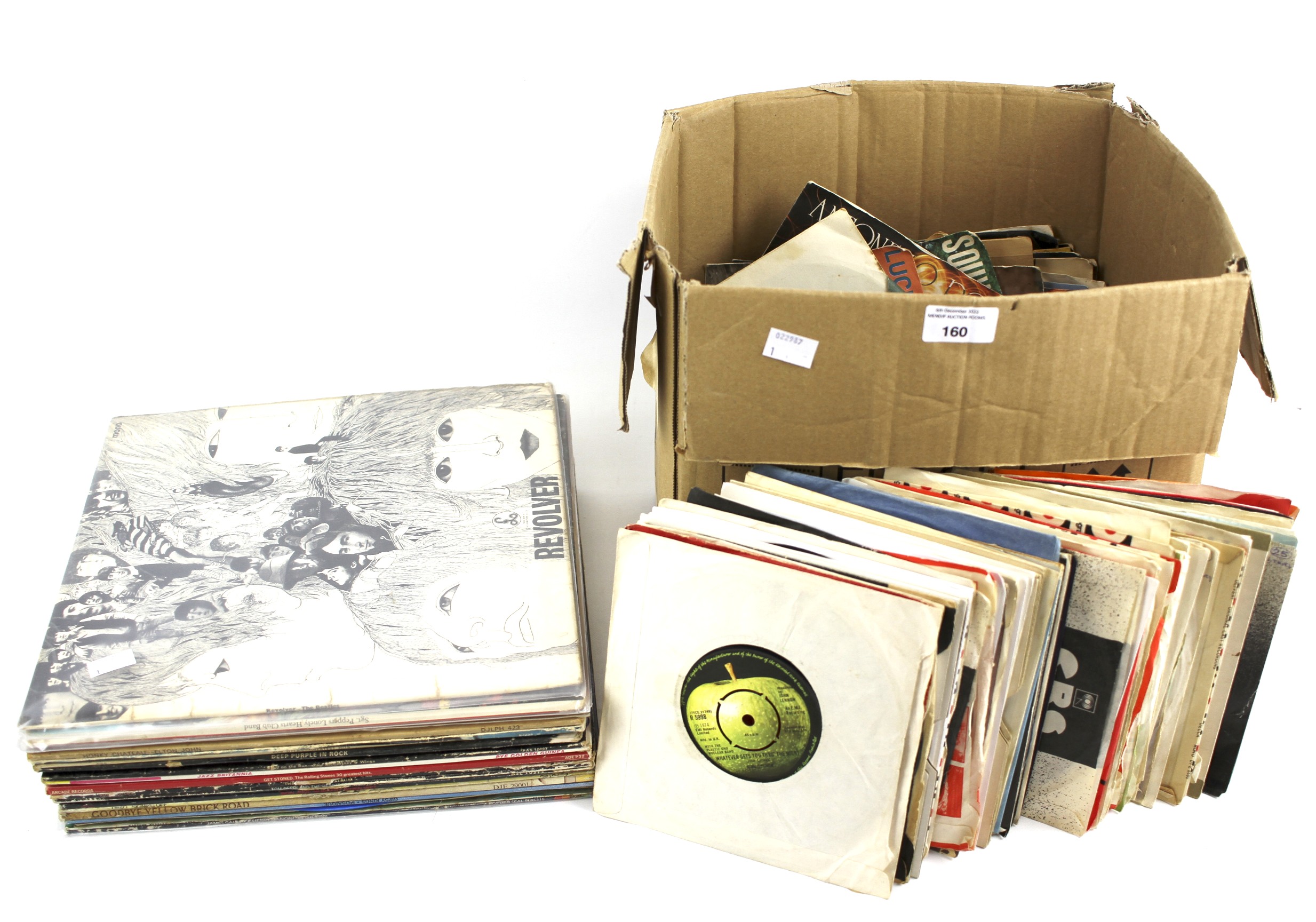 An assortment of vinyl albums and LPs.