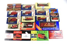 An assortment of postal diecast model vehicles.