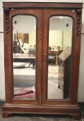 A Victorian mahogany wardrobe.