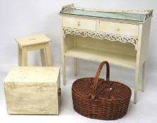 Assorted furniture and a wicker basket.
