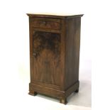 An early 20th century continental walnut veneer pot cupboard.