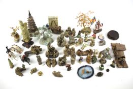 An assortment of Chinese miniature pottery figures.