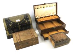 A collection of four wooden boxes.