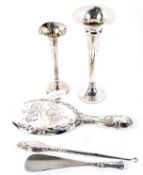 Five vintage silver table items.