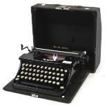 A vintage Blue Bird typewriter.
