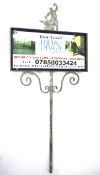 A contemporary 'Blacksmith' sign stand.