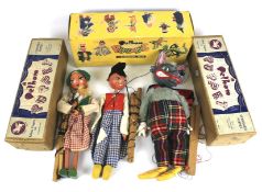 Three boxed Pelham Puppets.