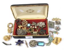 A box of 19th century and later brooches.