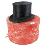 A Whyatt black silk top hat.