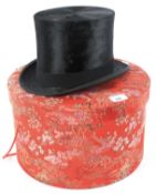 A Whyatt black silk top hat.