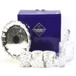 A boxed Edinburgh Crystal table set. In the 'Embassy' pattern, including a tray, decanters, etc.