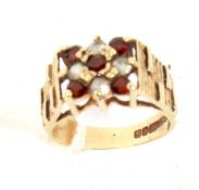 A vintage 1970s 9ct gold gem set dress ring.