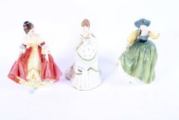 Three porcelain figures of ladies.