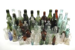 A comprehensive collection of 19th century and later glass bottles.