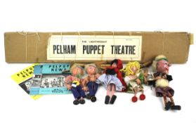 Five Pelham puppets.