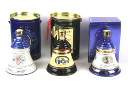 Three Bell's Old Scotch Whisky decanters.