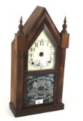 A late 19th century mahogany cased American mantel clock.