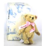 A boxed Steiff 'Royal Baby' bear.