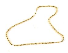 A continental yellow metal bead necklace stamped 14k.