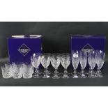 Two boxed sets of eight Edinburgh Crystal glasses.