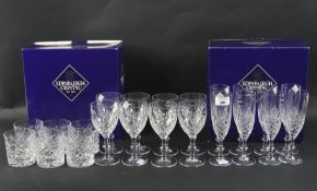 Two boxed sets of eight Edinburgh Crystal glasses.