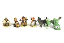 A collection of Goebel Hummel figures and other ceramics.