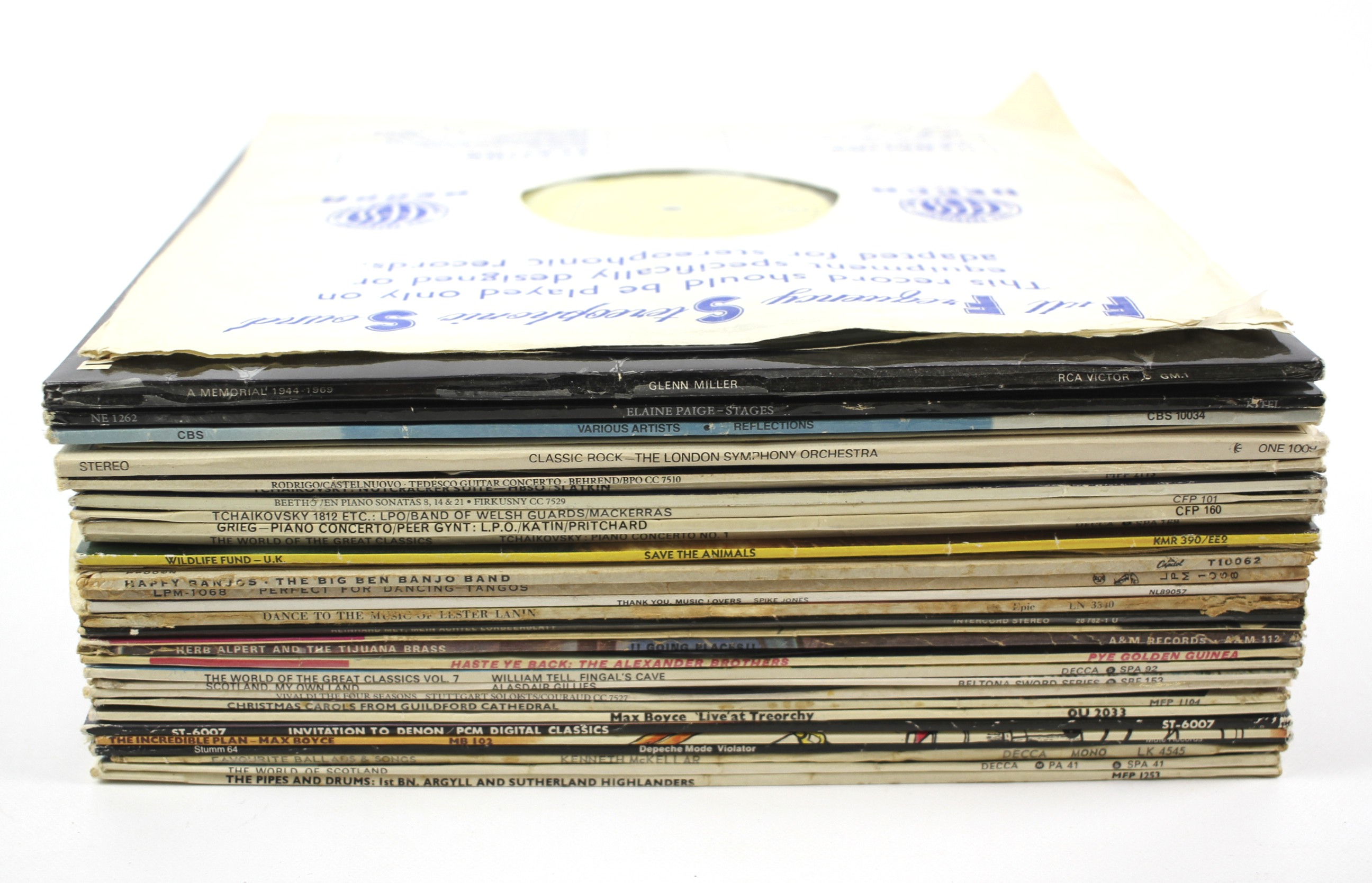 A quantity of vintage vinyl records in an LP carry box.