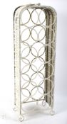 A contemporary white painted metal wine rack.