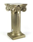 A contemporary silvered plaster Ionic column jardiniere.