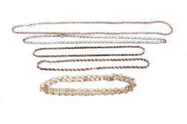 An assortment of silver chains.
