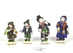 Two pairs of Rudolstadt Volkstedt porcelain figures of vagabonds.