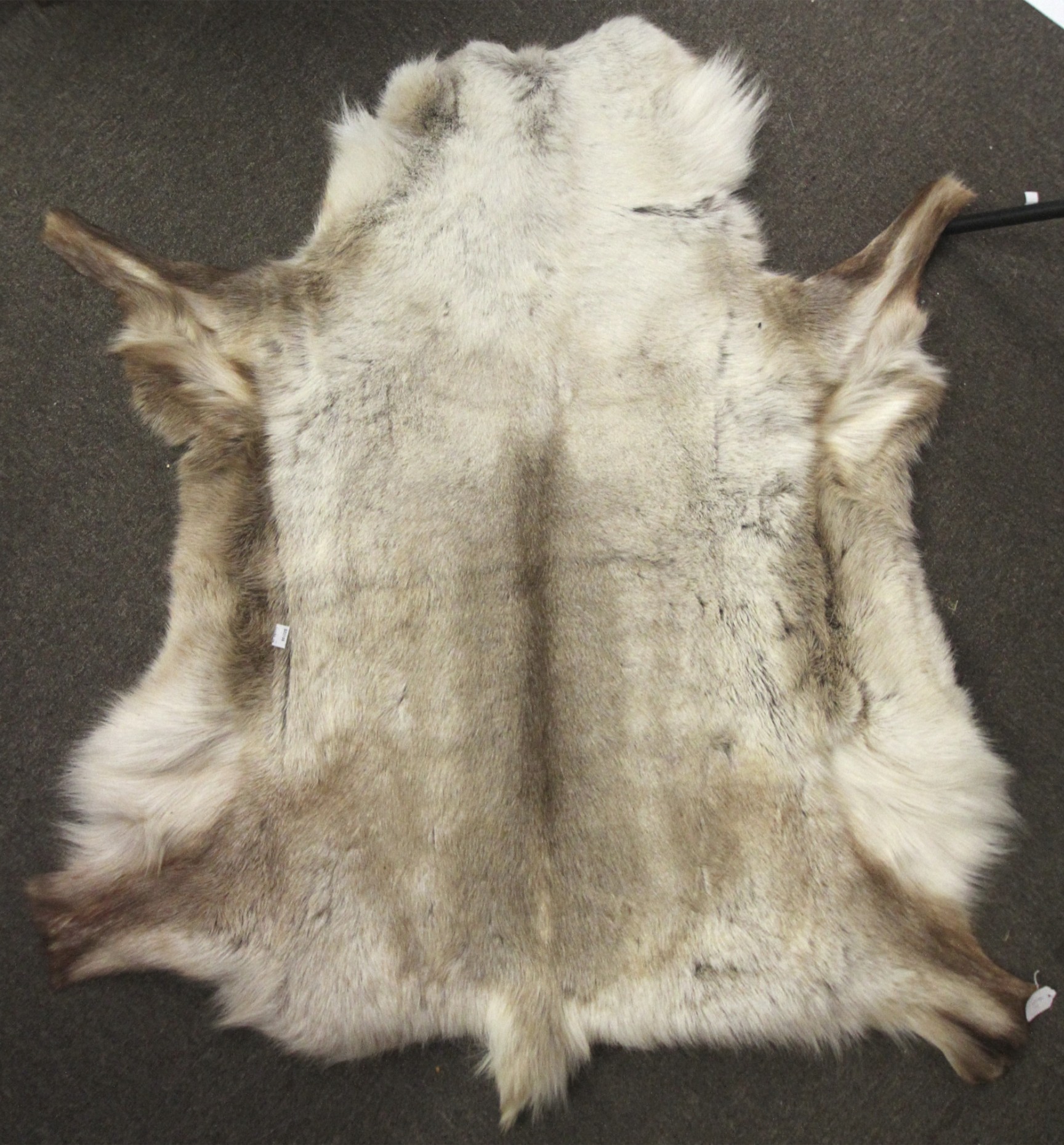 A natural goatskin rug.