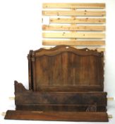A 19th century 4ft walnut sleigh bed frame.