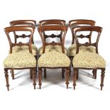 A set of six Victorian mahogany balloon back dining chairs.