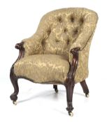 A Victorian stained beech button back scroll armchair.