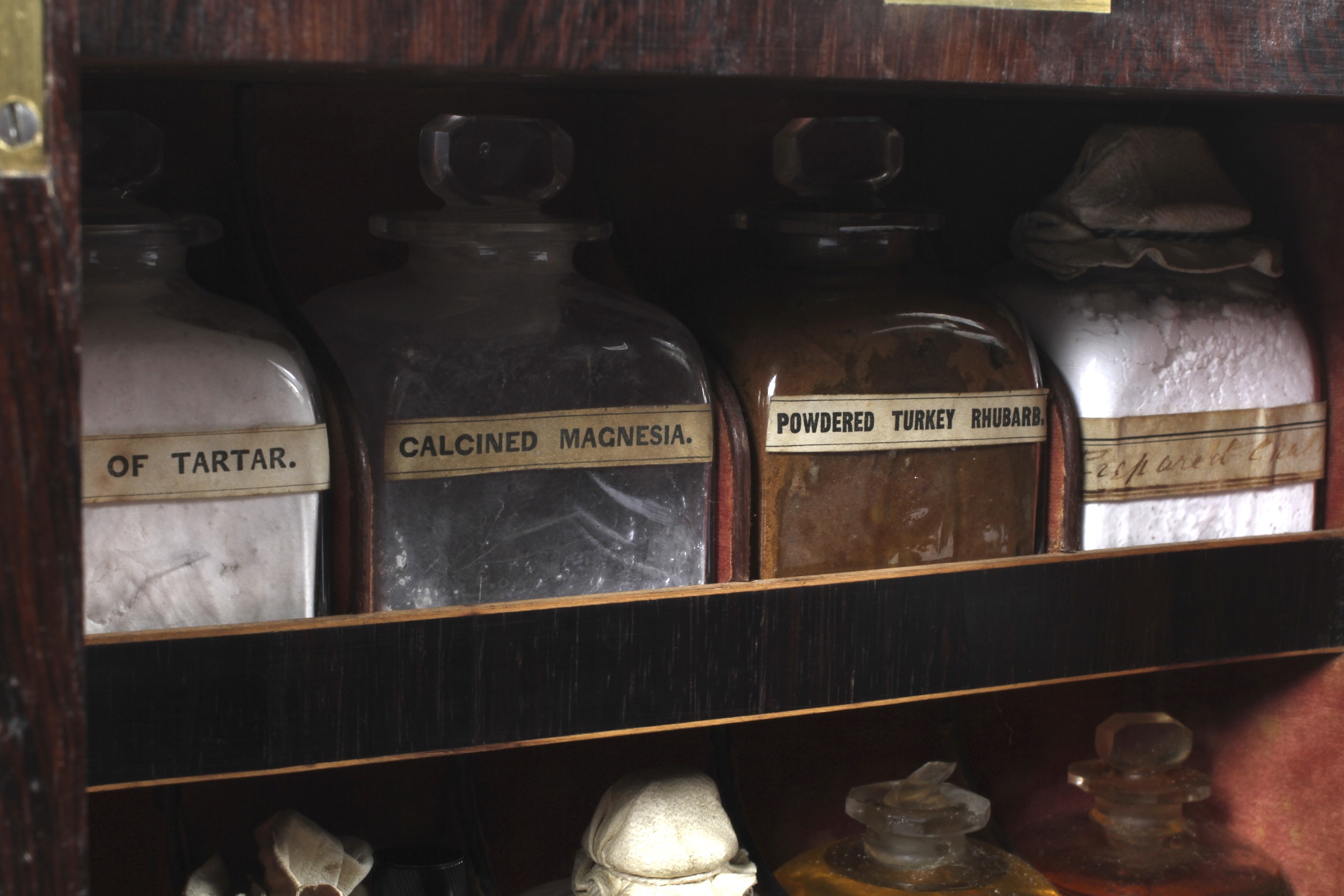 A Victorian rosewood travelling apothecary cabinet with contents. - Image 7 of 17