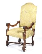 A Venetian style carved oak high backed hall chair.